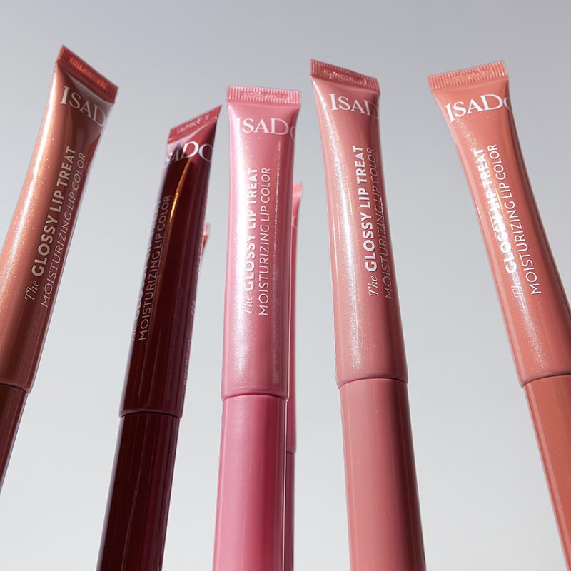 Гланц за обем с хидратираща и подхранваща формула IsaDora Glossy Lip Treat